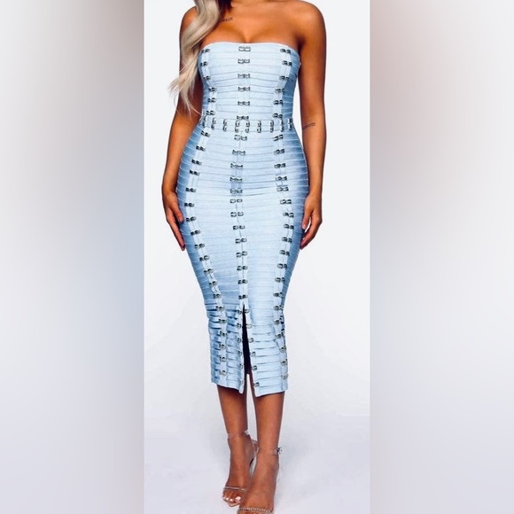 Fashion Nova Dresses & Skirts - Baby blue bandage dress with gold buckles.